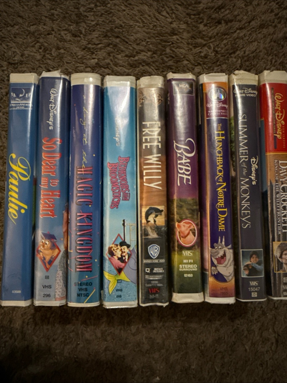 Disney VHS Lot with Purple, Blue, Red and Orange Spines